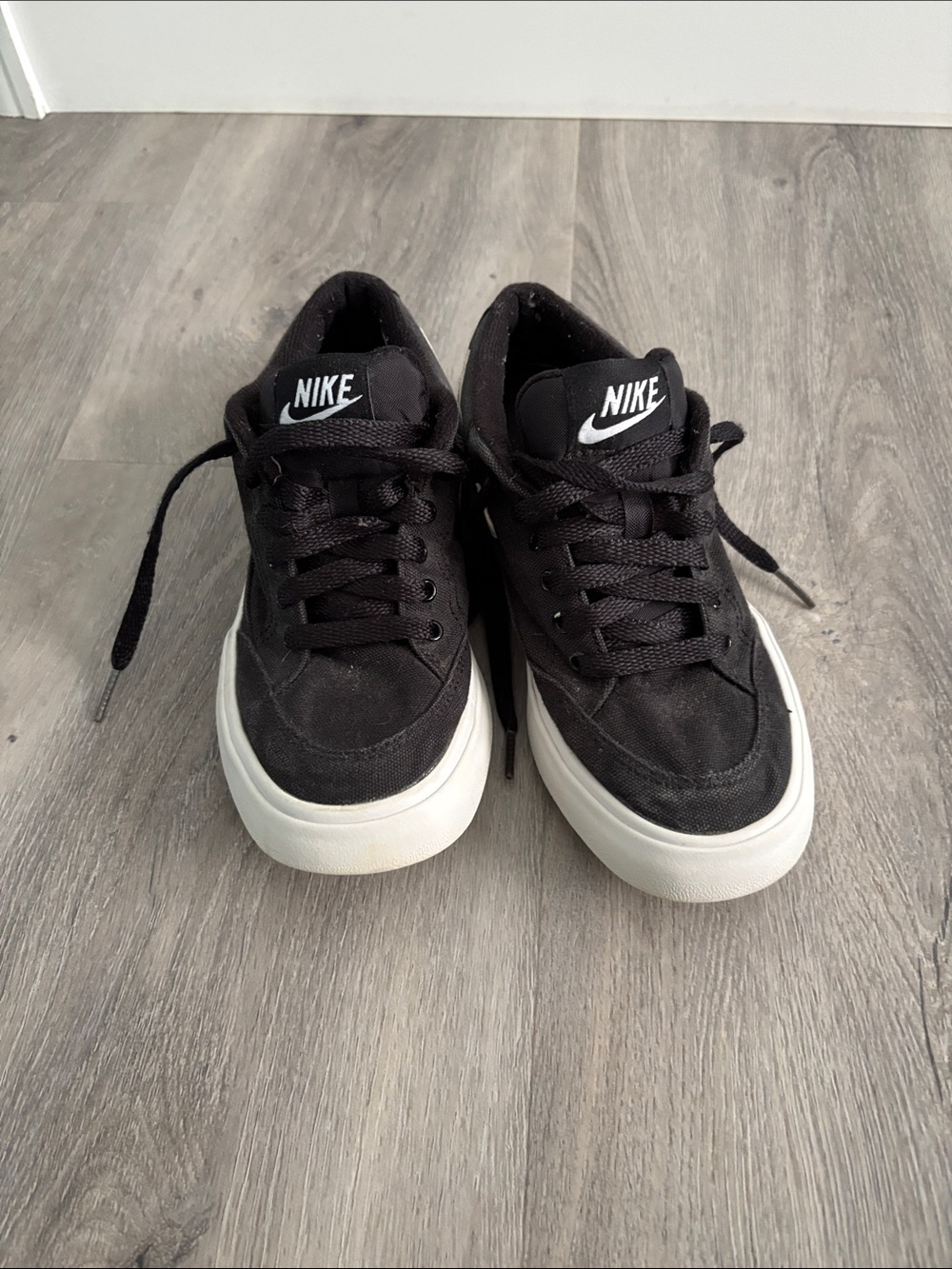 Nike Black Canvas Low-Top Sneakers with White Soles and White Logo
